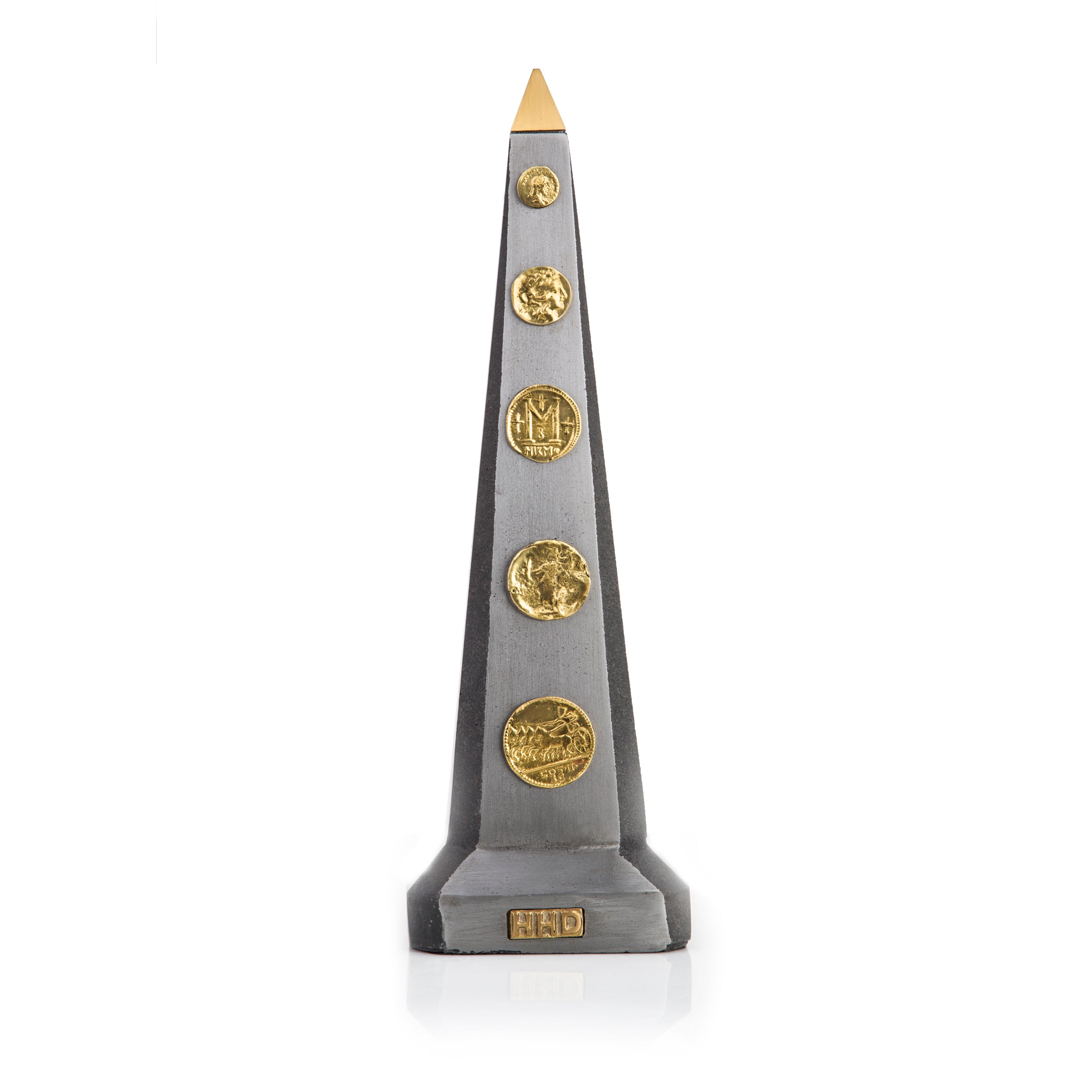 Obelisk with coins